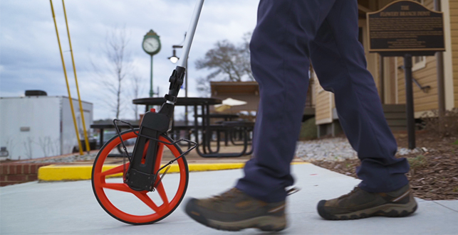 Measuring wheel used during a field survey